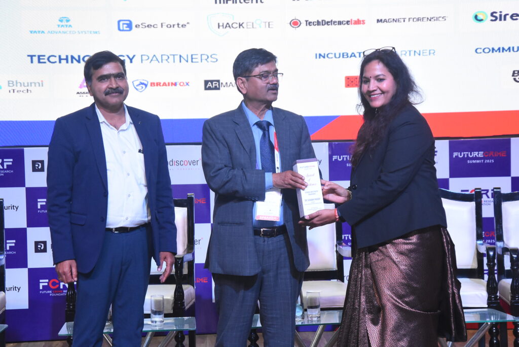 Dr. Surbhi Pandey receiving her award at FutureCrime Summit 2025.