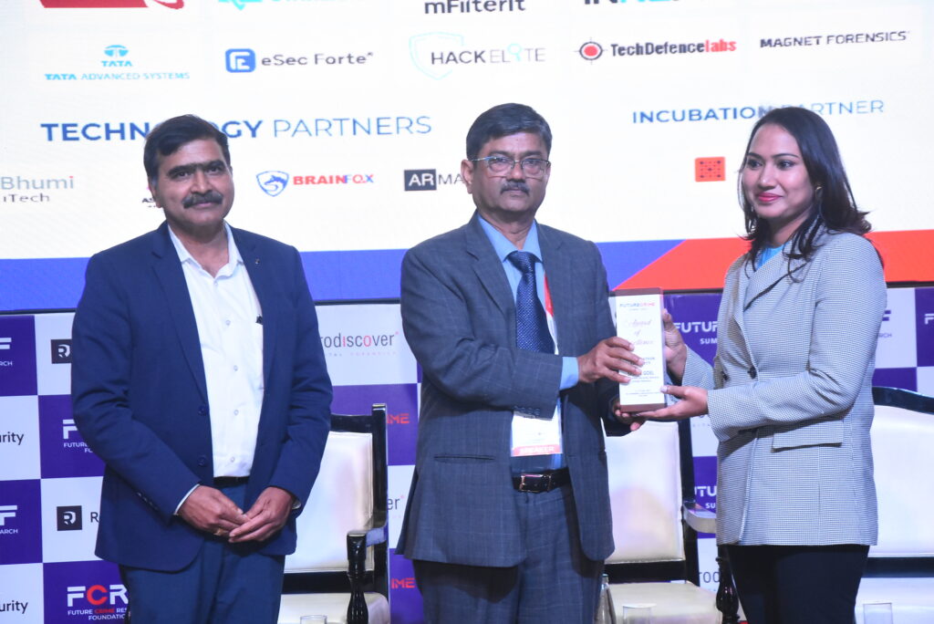 Seema Goel receiving her award at FutureCrime Summit 2025.