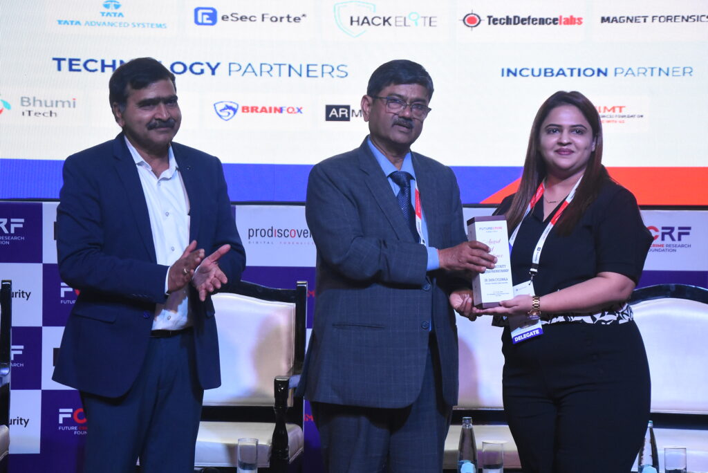 Dr. Shifa Cyclewala  receiving her award at FutureCrime Summit 2025.