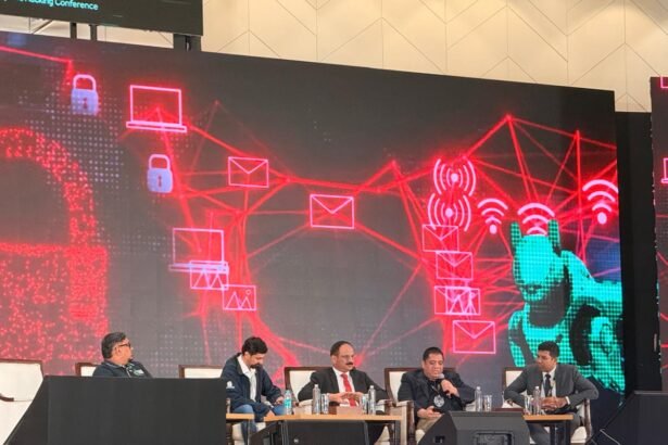 Lt Gen (Retd.) M. U. Nair, former National Cyber Security Coordinator, leads a discussion on trust and transparency as cornerstones of cyber resilience at c0c0n 2025 in Kochi.